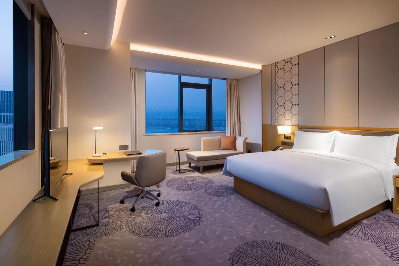 Holiday Inn Tianjin Xiqing By Ihg מראה חיצוני תמונה