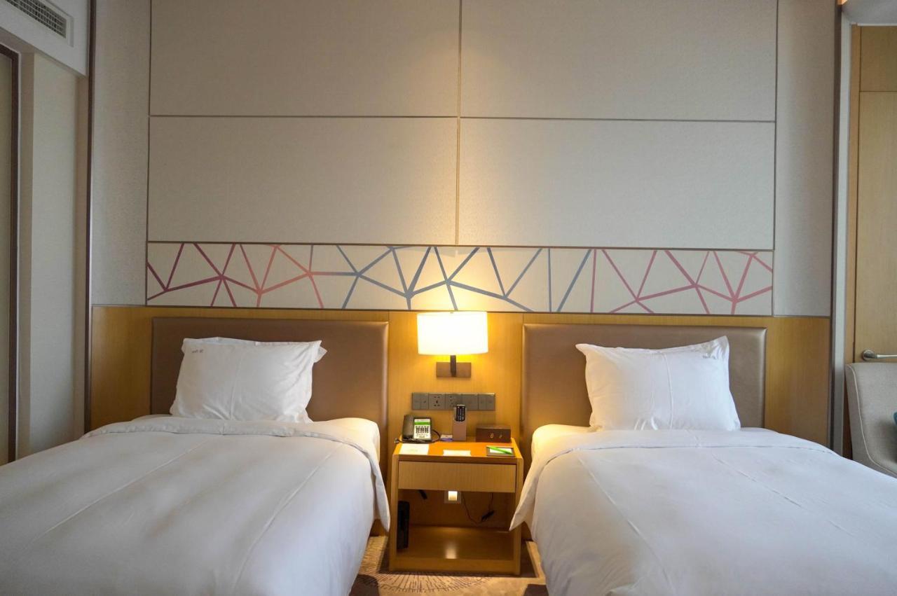 Holiday Inn Tianjin Xiqing By Ihg מראה חיצוני תמונה