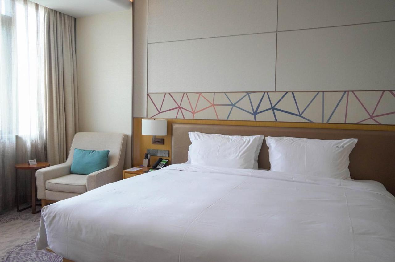 Holiday Inn Tianjin Xiqing By Ihg מראה חיצוני תמונה