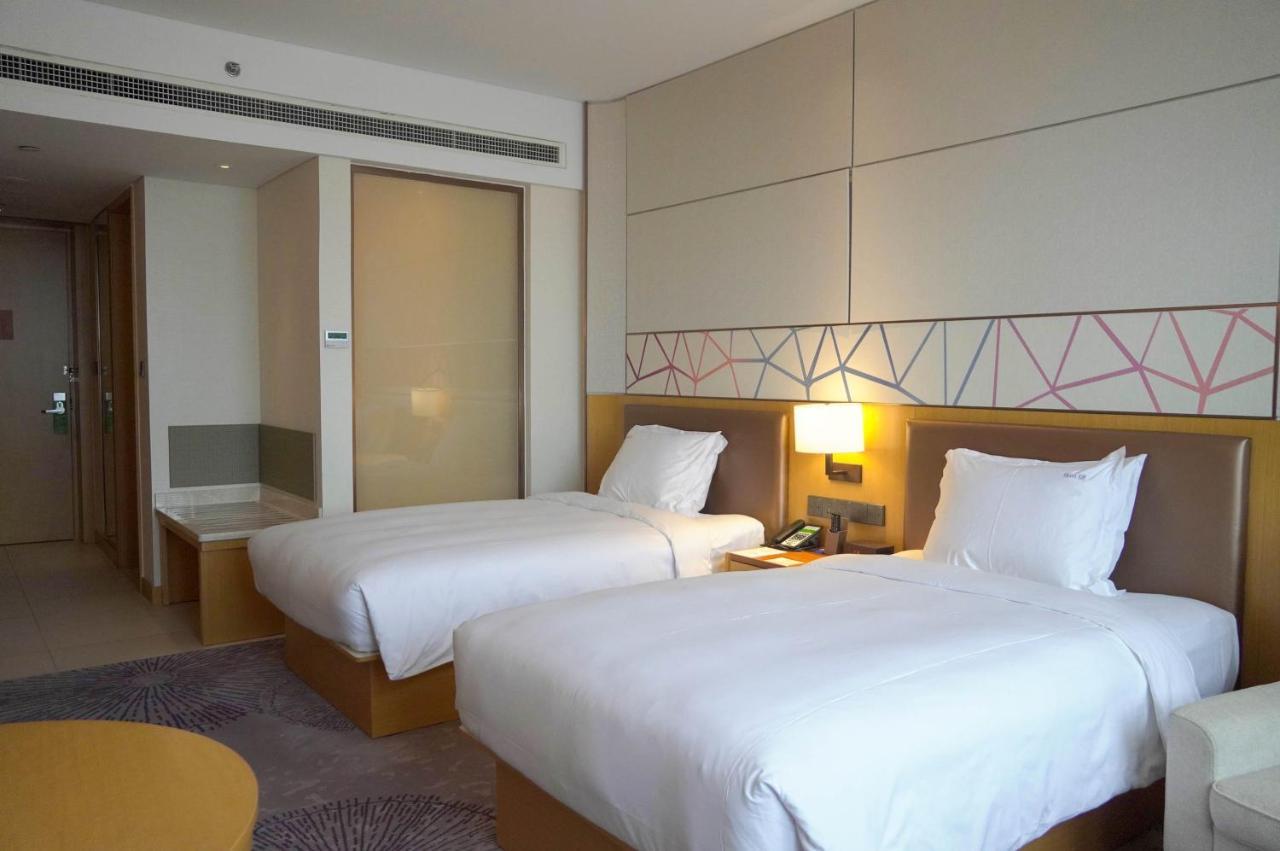 Holiday Inn Tianjin Xiqing By Ihg מראה חיצוני תמונה